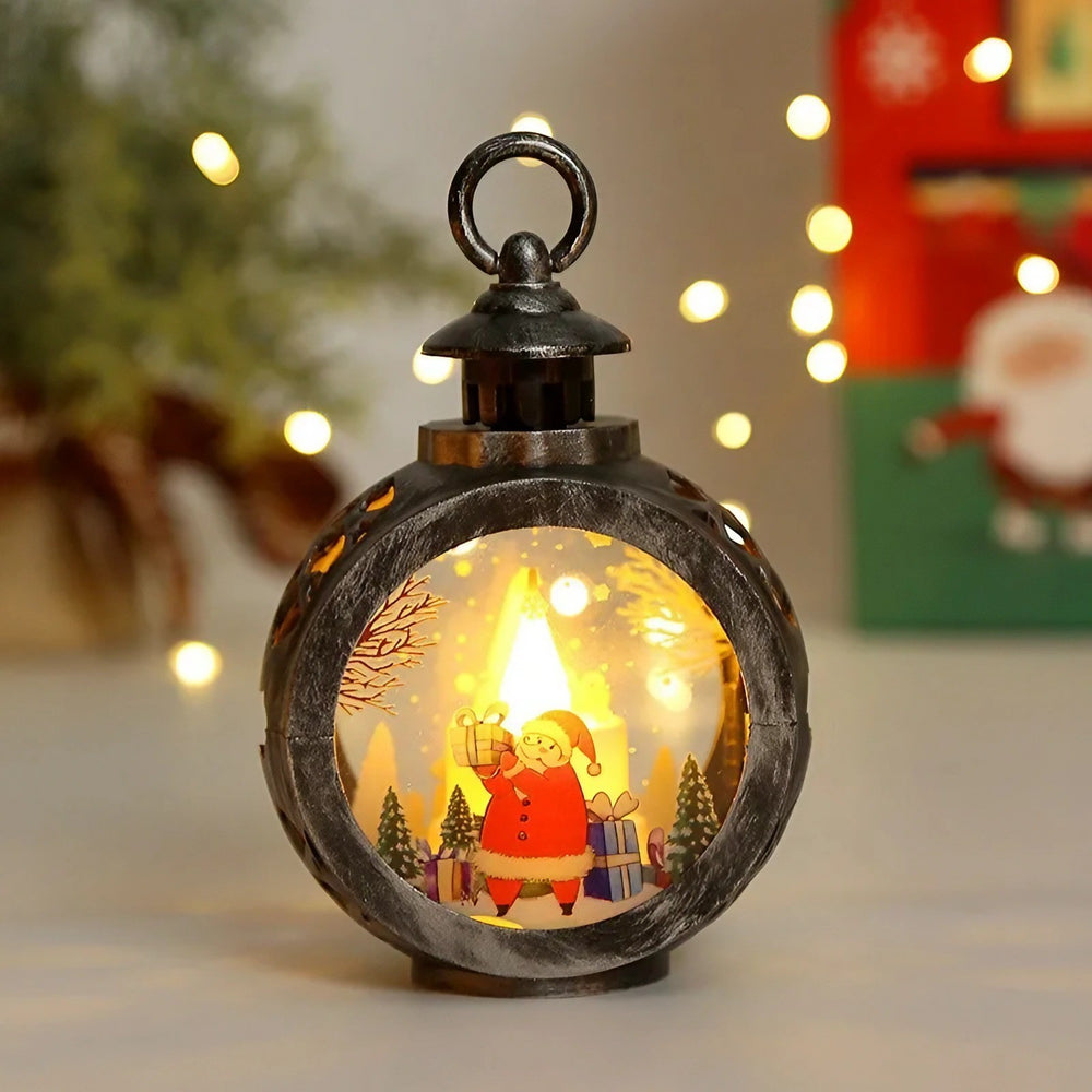 Decoratiune Craciun tip Felinare cu baterii, 13.5 x 9 cm, Lumanare cu geam si inscriptie Mos Craciun, lumina alb cald, baterii incluse, Bronz Argintiu