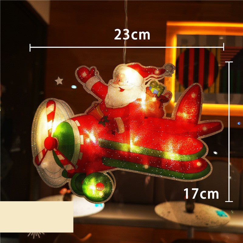 Decoratiune de Craciun pentru Fereastra, Model Mos Craciun in Avion, Iluminare LED, 23 cm, Multicolor, Lumina Alb Cald