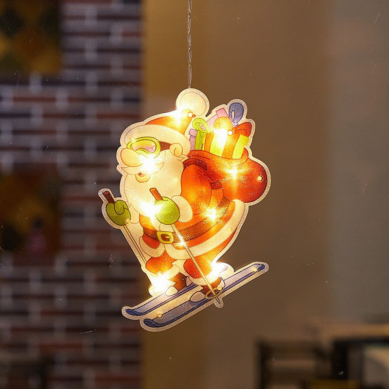 Decoratiune de Craciun pentru fereastra, Mos Craciun pe schiuri, cu LED-uri, 15 cm, alb cald