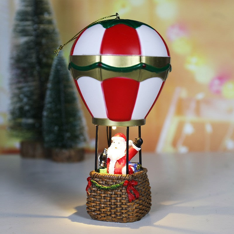 Decoratiune de Craciun tip Balon cu Aer Cald, Balon cu Mos Craciun, din Rasina, Model Balon cu Aer Cald si Mos Craciun Iluminare LED, 17 x 5 x 5 cm, Gri Rosu