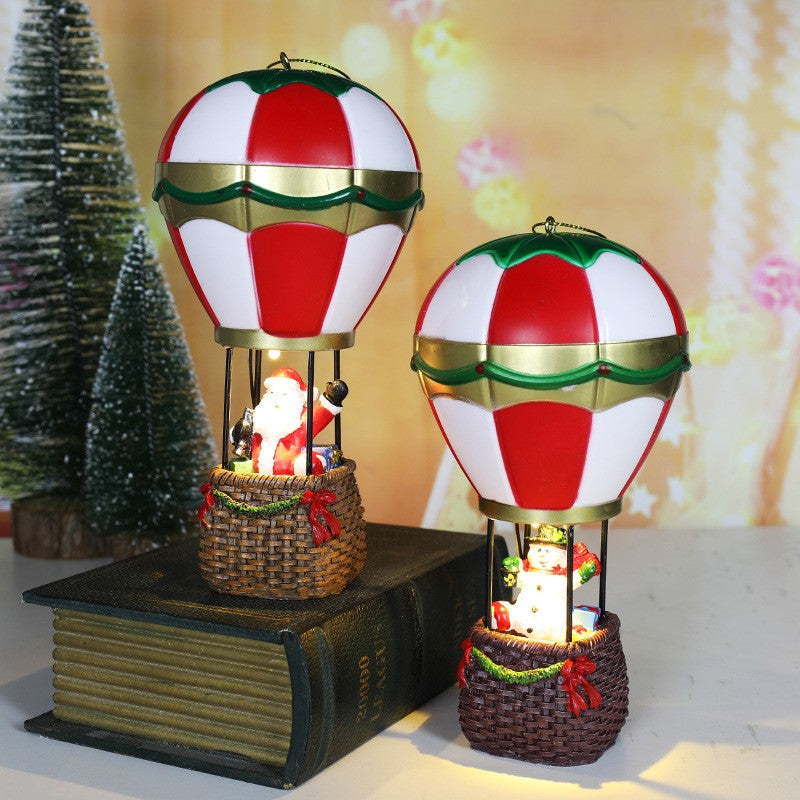 Decoratiune de Craciun tip Balon cu Aer Cald, Balon cu Mos Craciun, din Rasina, Model Balon cu Aer Cald si Mos Craciun Iluminare LED, 17 x 5 x 5 cm, Gri Rosu
