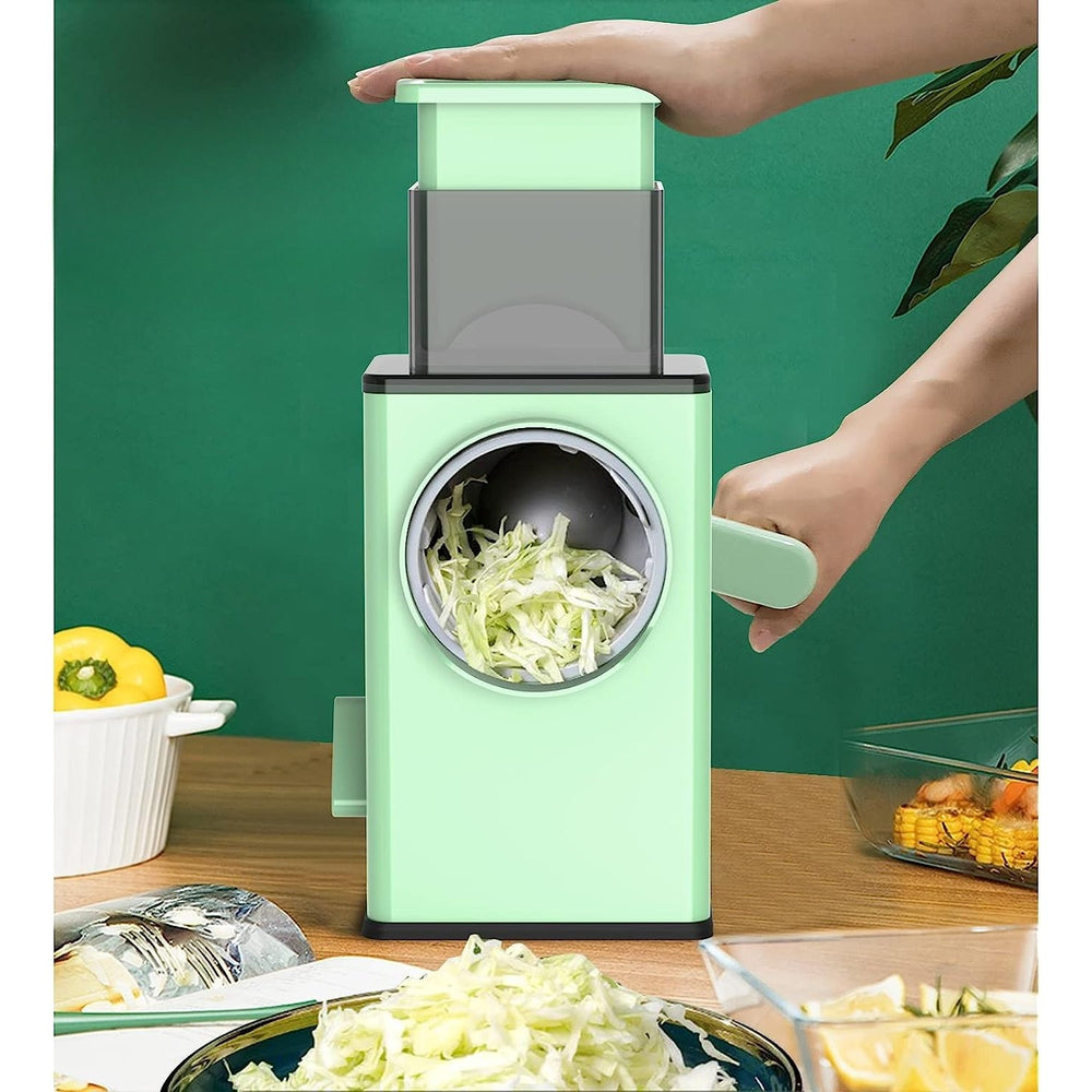 Feliator manual pentru legume, 3 lame din otel inxodabil, 3 tipuri de feliere, material carcasa ABS, latime maxima feliere 4 mm, baza de tip ventuza, usor si sigur de utilizat, 28.5 x 9, 2 x 13.5 cm, verde