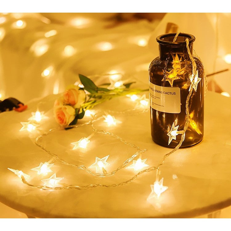Instalatie Craciun cu baterii, 1.5 metri, 10 LED-uri tip Stea, fir Transparent, Alb Cald