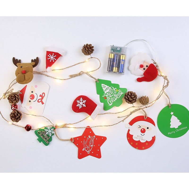 Instalatie Craciun cu baterii, 2 metri, 20 LED-uri tip Conuri de pin si figurine, Alb Cald