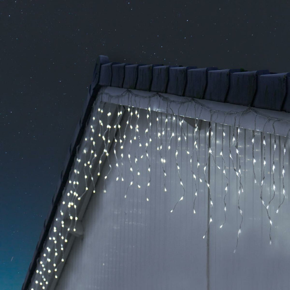 Instalatie Craciun, Tip Franjuri/Turturi, 4 m, 120 LED-uri, Prelungitor 1.5 m, 8 Jocuri de Lumini, Interconectabila, Conectare la Retea, Fir transparent, Interior/Exterior, Alb Rece