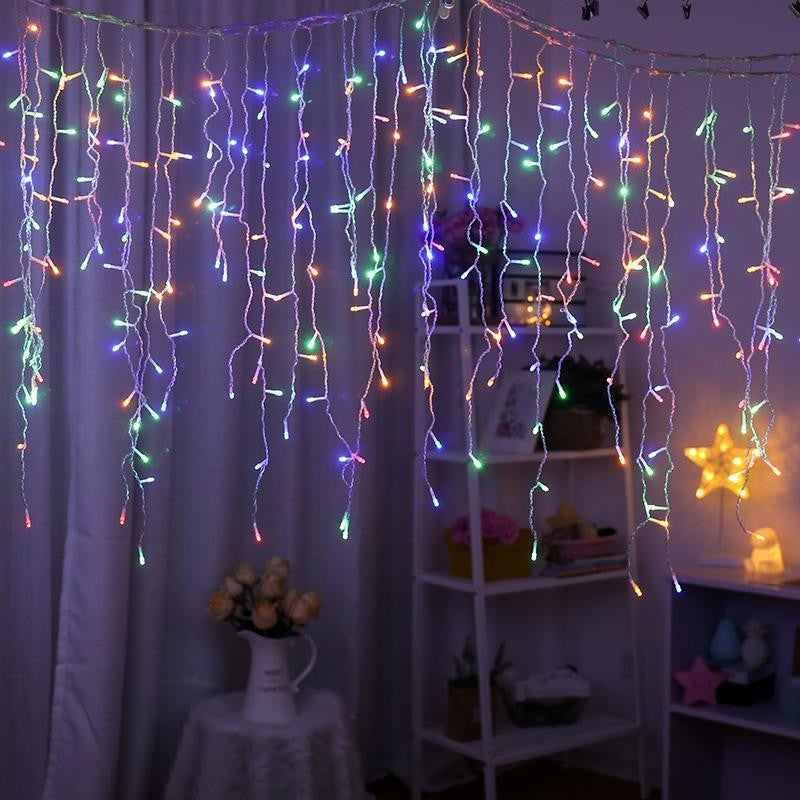 Instalatie Craciun, Tip Franjuri/Turturi, 7 m, 200 LED-uri, Prelungitor 1.5 m, 8 Jocuri de Lumini, Interconectabila, Conectare la Retea, Fir transparent, Interior/Exterior, Multicolor