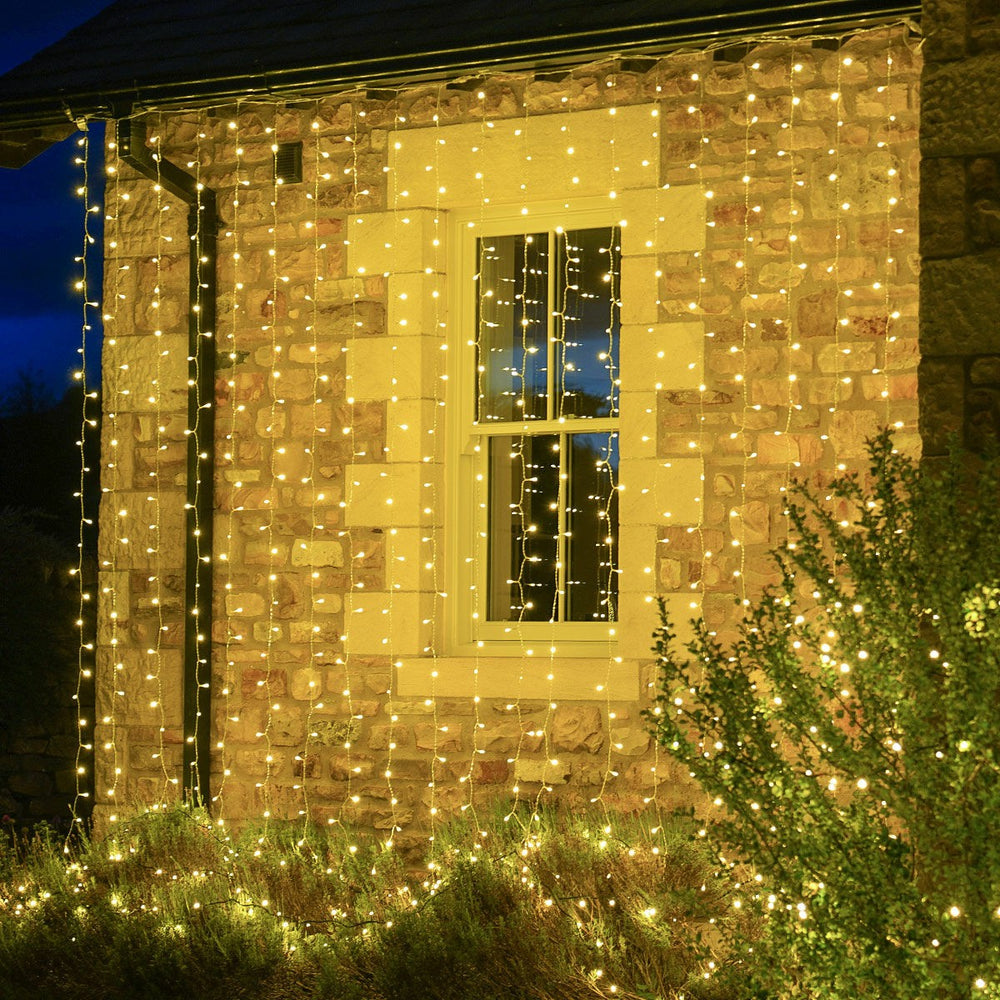 Instalatie Craciun, Tip Perdea, 3 m x 3 m, 320 LED-uri, Prelungitor 1.5 m, 8 Jocuri de Lumini, Interconectabila, Fir transparent, Interior/Exterior, Alb Cald