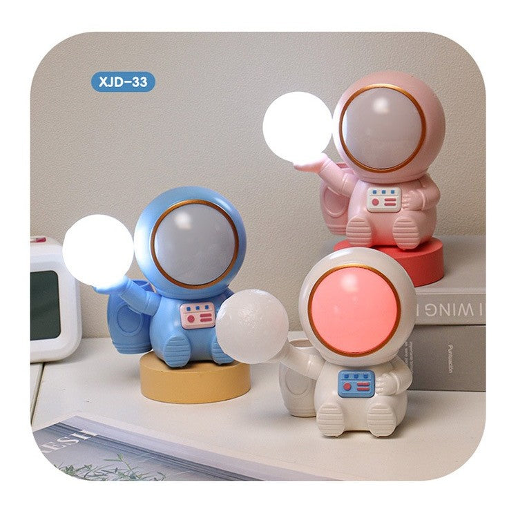 Lampa de Veghe 2in1, Lampa, Ascutitoare si Spatiu Depozitare, Model Astronaut, Incarcare USB, din ABS, 12 x 7 x 11 cm, Lumina Led, Multicolor