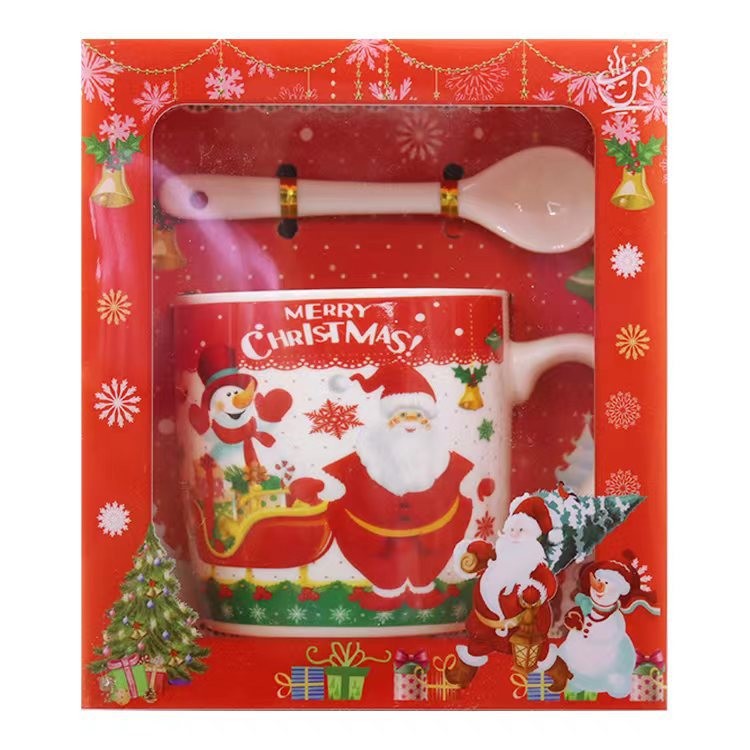 Set cana ceramica cu lingurita, 200 ml, tematica Mos Craciun cu sanie, multicolor